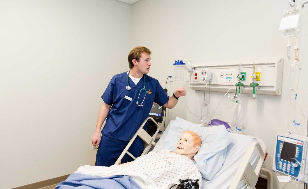 male nurse with dummy