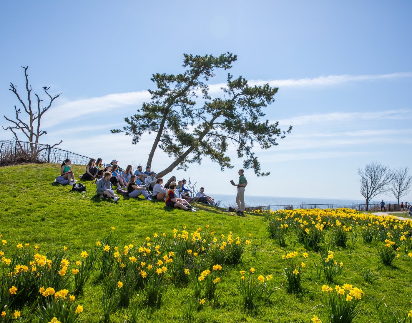 Professor Chace teaches class alongside Cliff Walk.