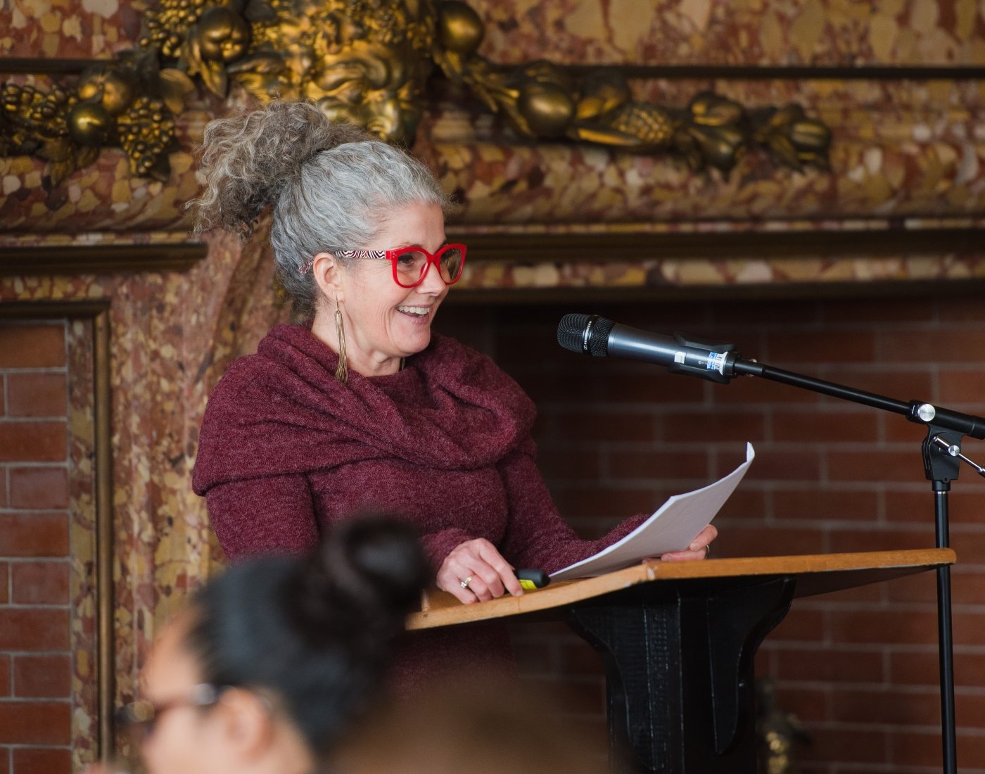 Dawn Emsellem speaks at the February 2025 Voices of Mercy luncheon.