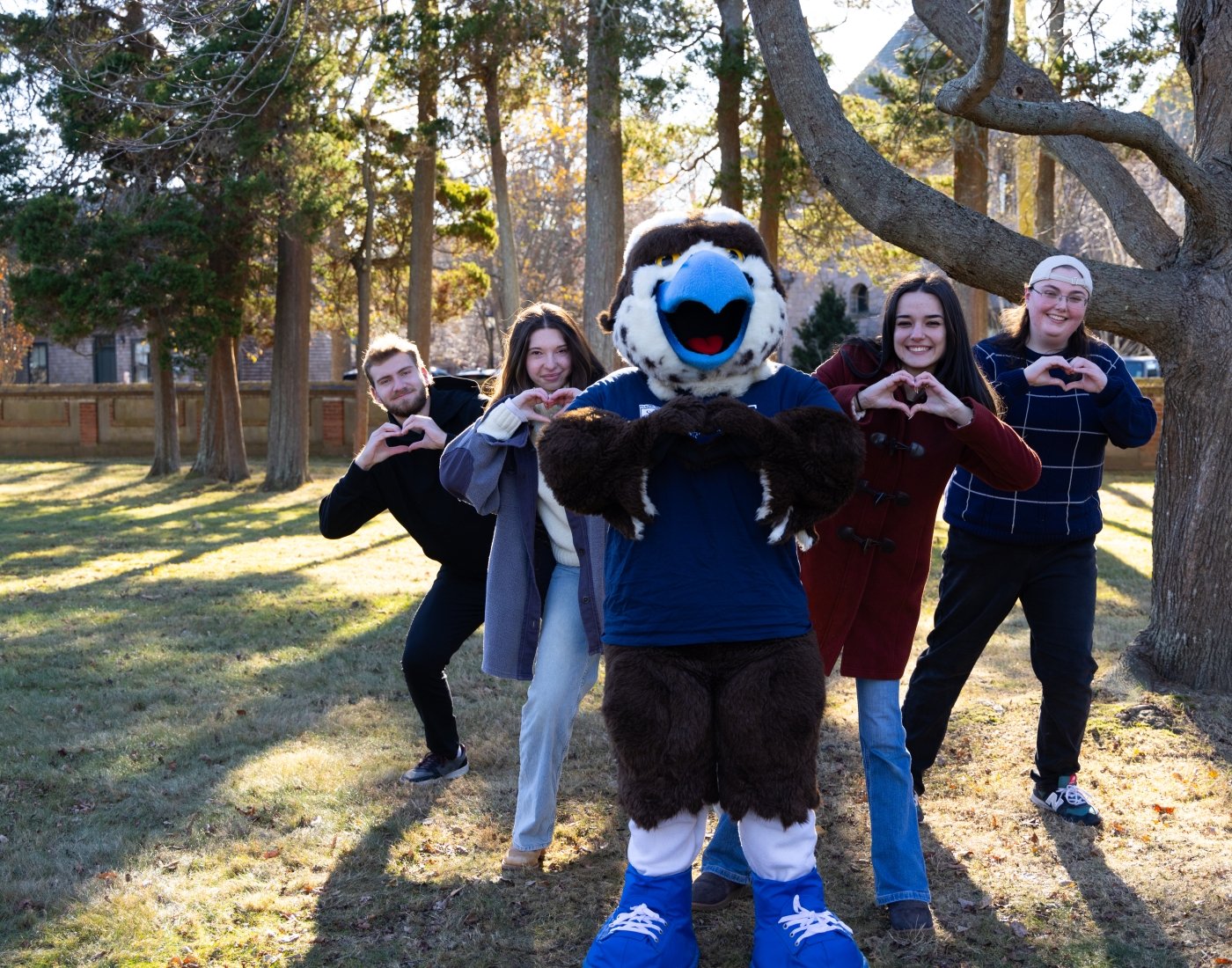 Salve Regina University students and Sammy the Seahawk
