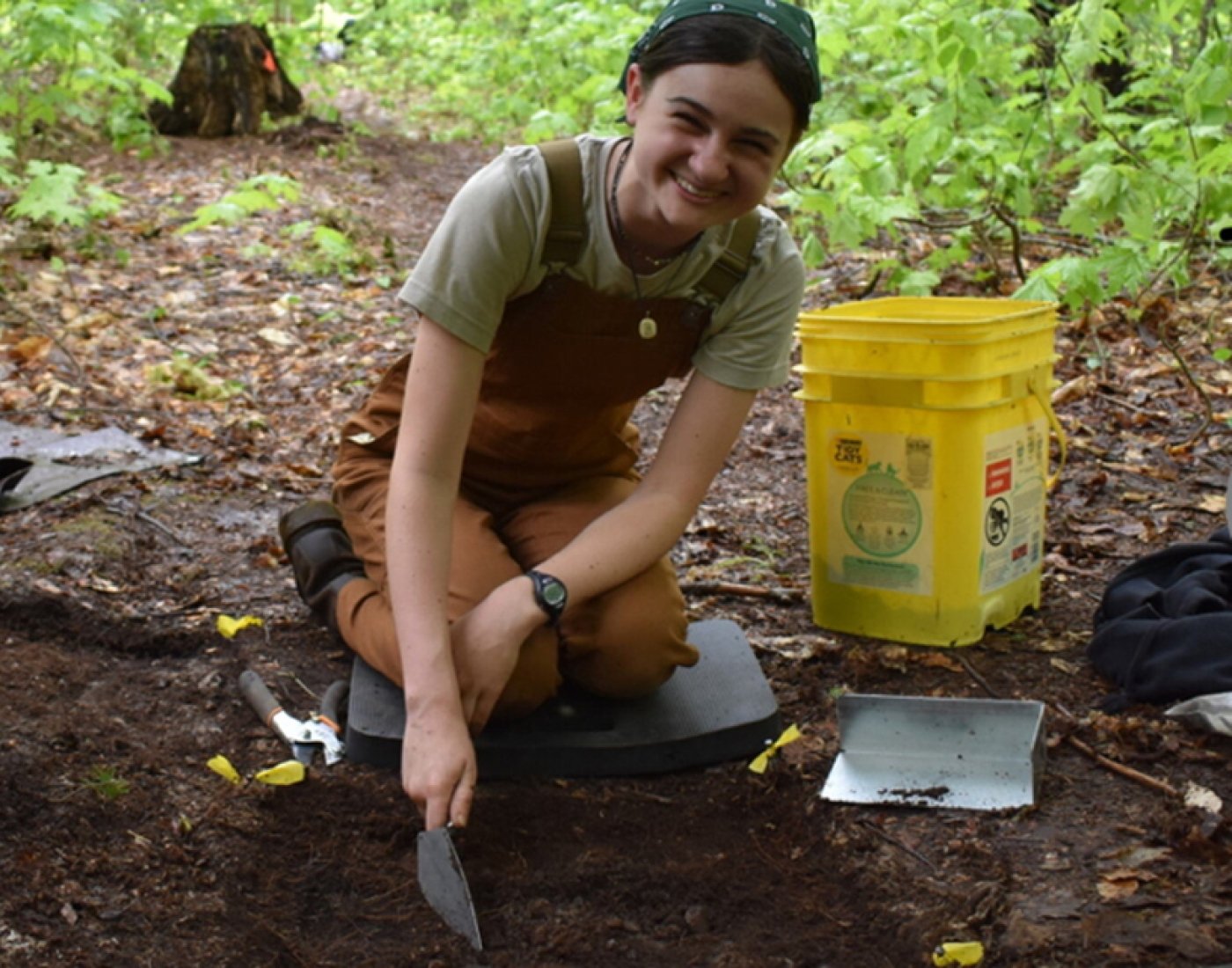 Student on an archaeological dig in northern Maine
