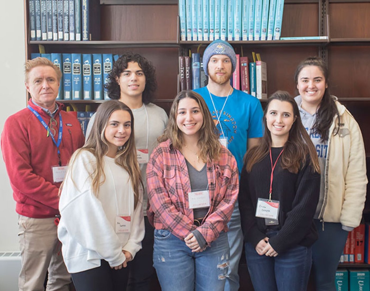 Group of college students in a library.