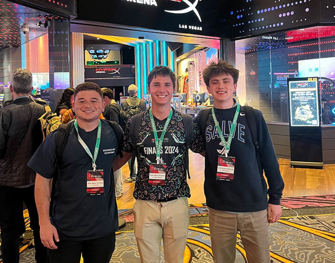 Three male students in an arena in Las Vegas