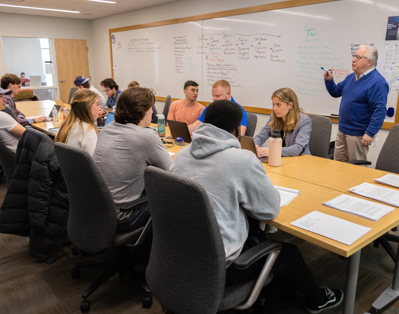 Sam Sacco and econometrics students meet in the Center for Business Outreach.