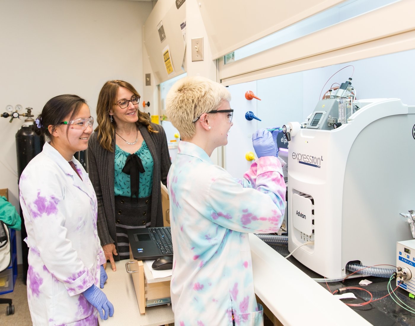 student using equipment in lab