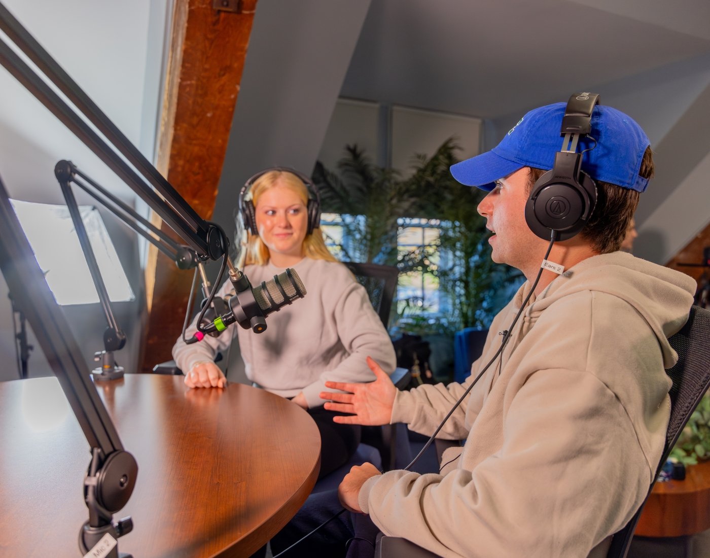 students using podcast equipment