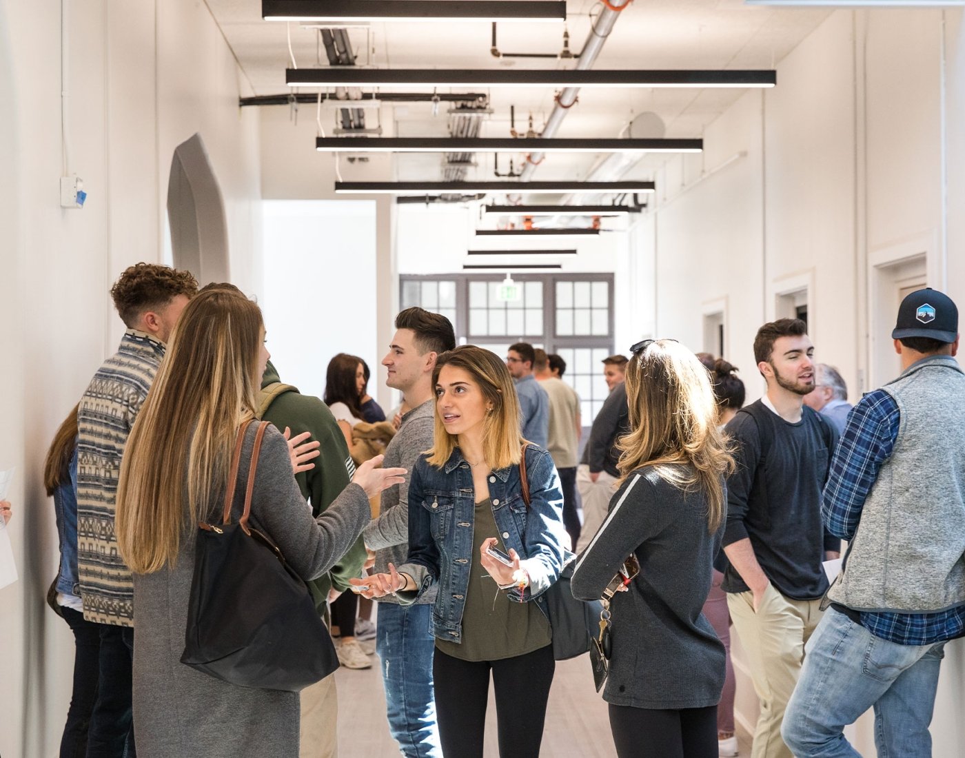 students talking at event
