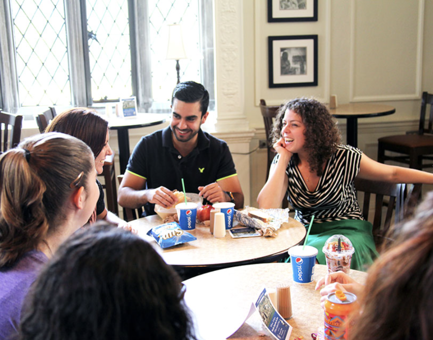 students around table eating