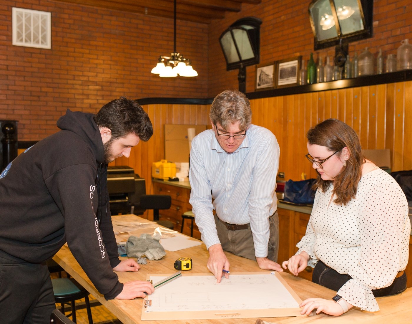 Faculty and students in cultural and historic preservation research lab.