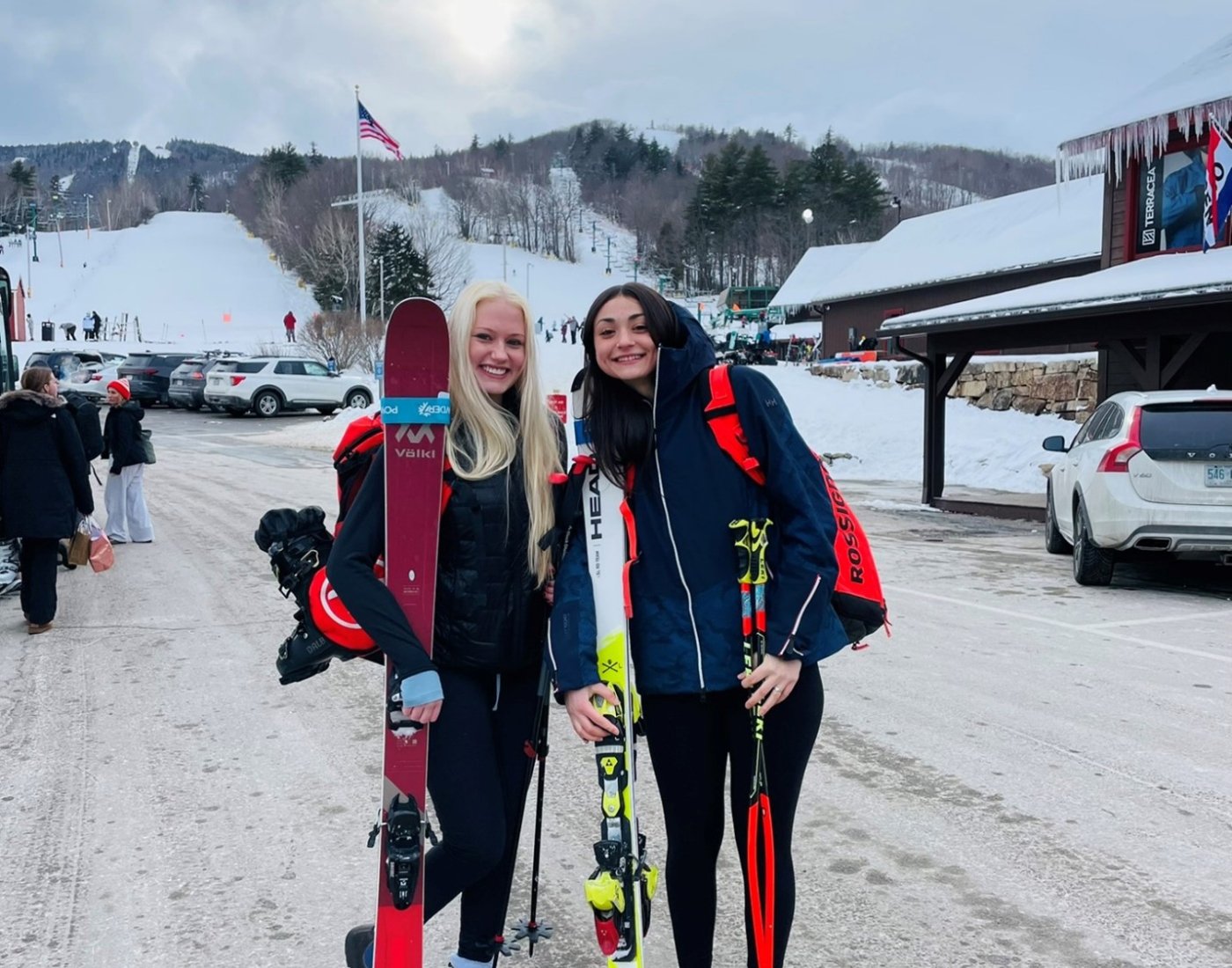 Two women with skiing gear