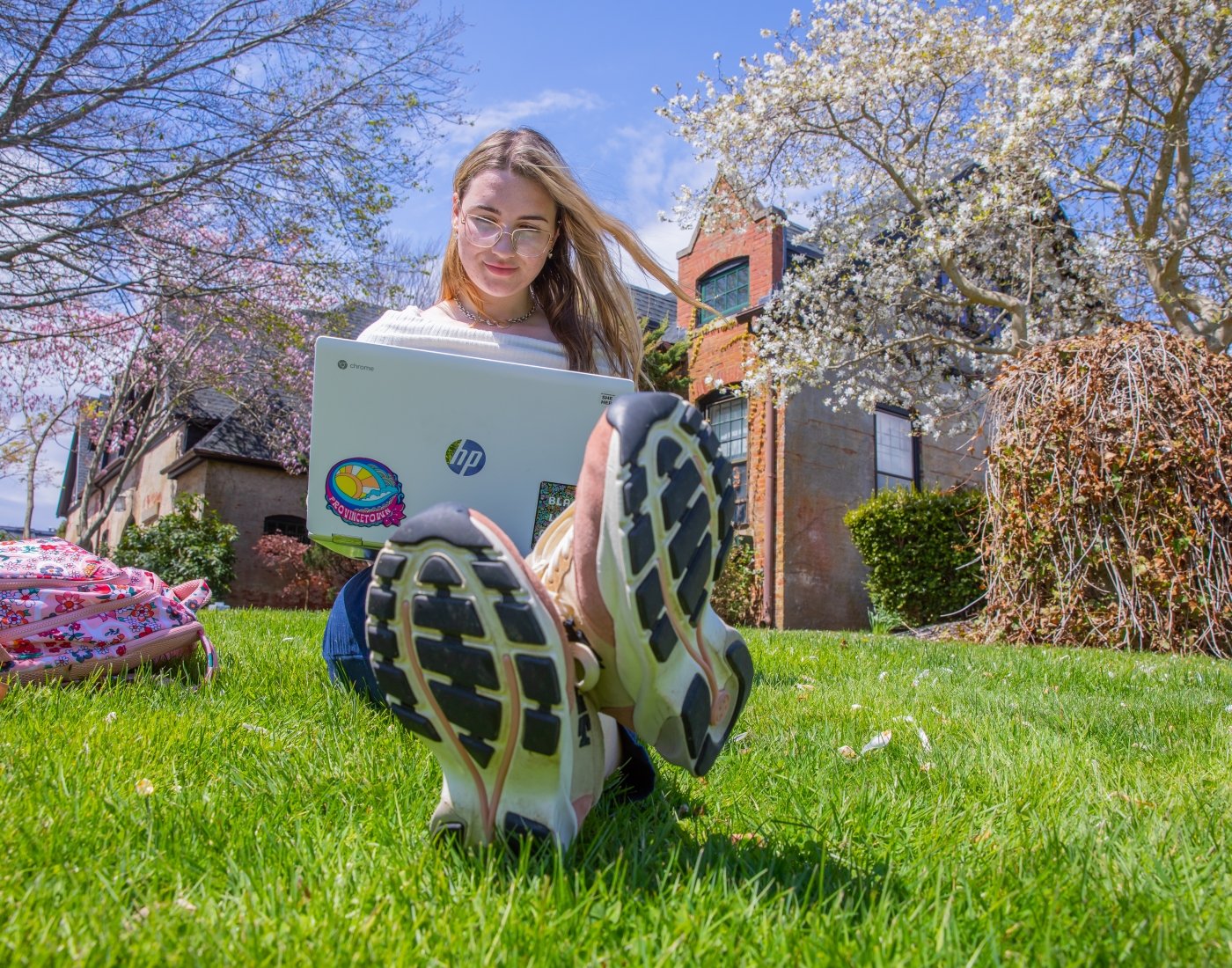 Salve Student Outside on Laptop