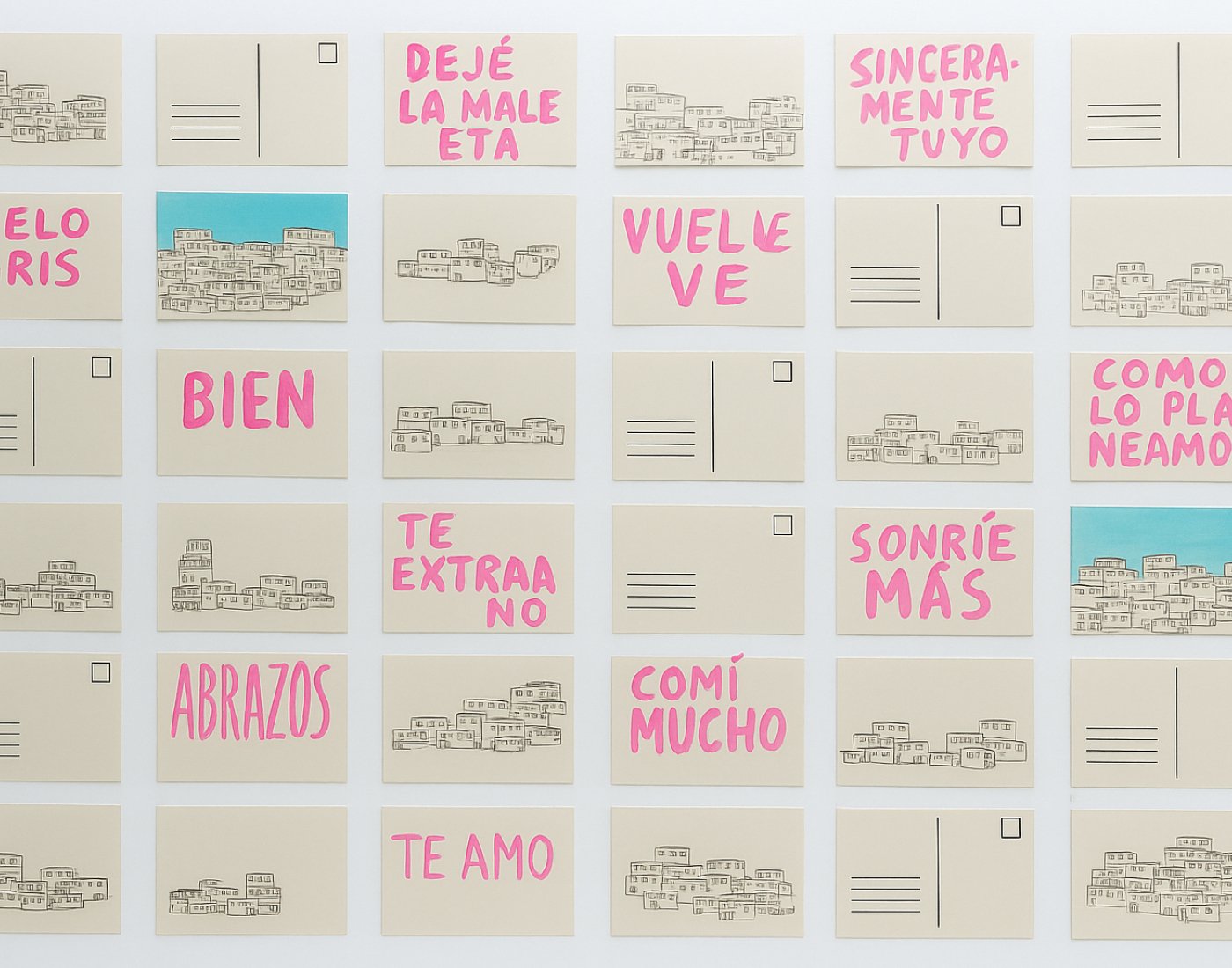 A piece of artwork featuring many squares with phrases written in Spanish