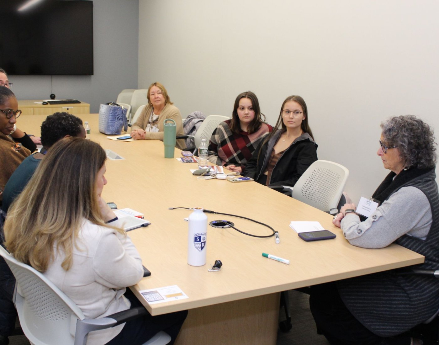 Community members and Salve students connect at a roundtable discussion.