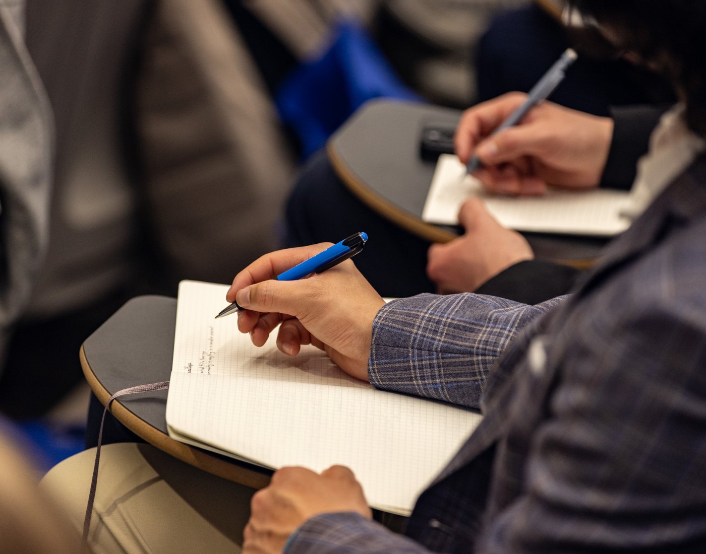 Student taking notes