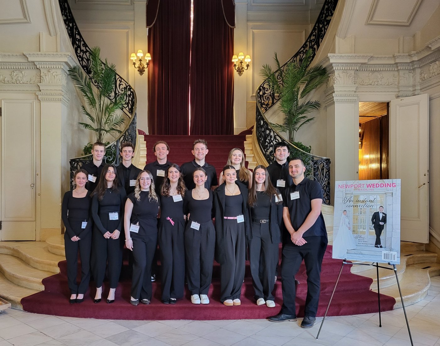 event management students on staircase at Rosecliff's Newport Wedding Show
