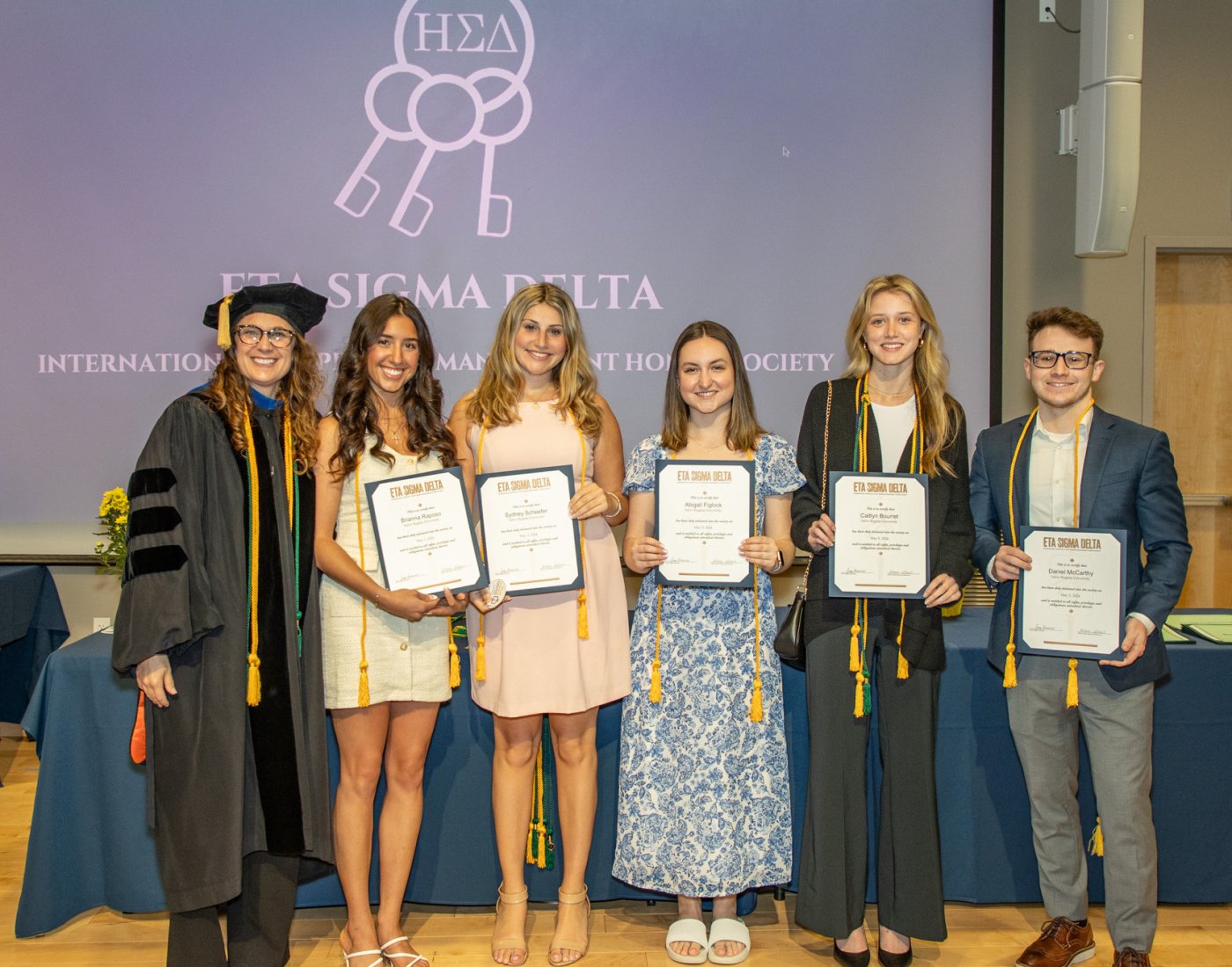 Eta Sigma Delta International Honor Society inductees