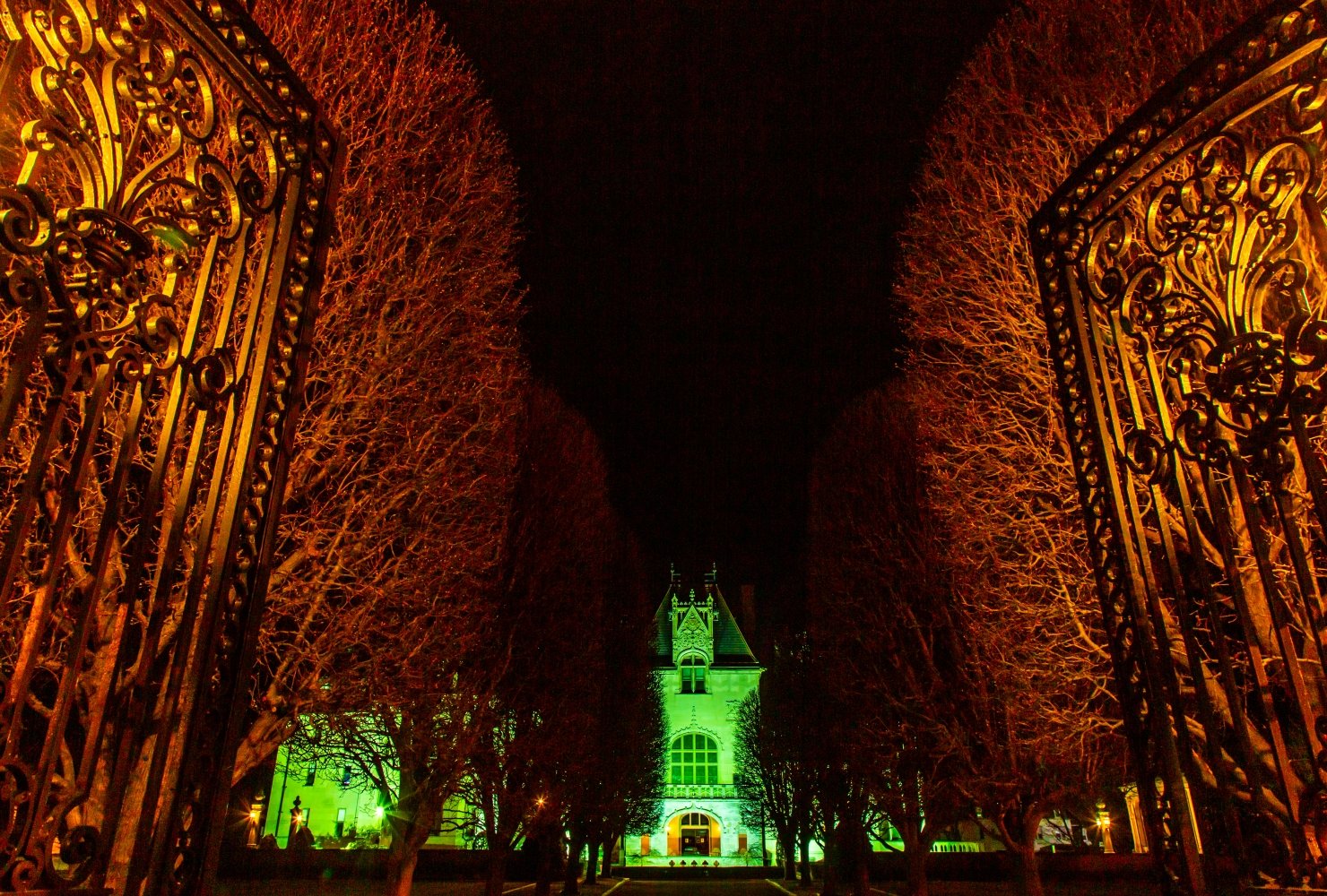 Ochre Court lit up green.