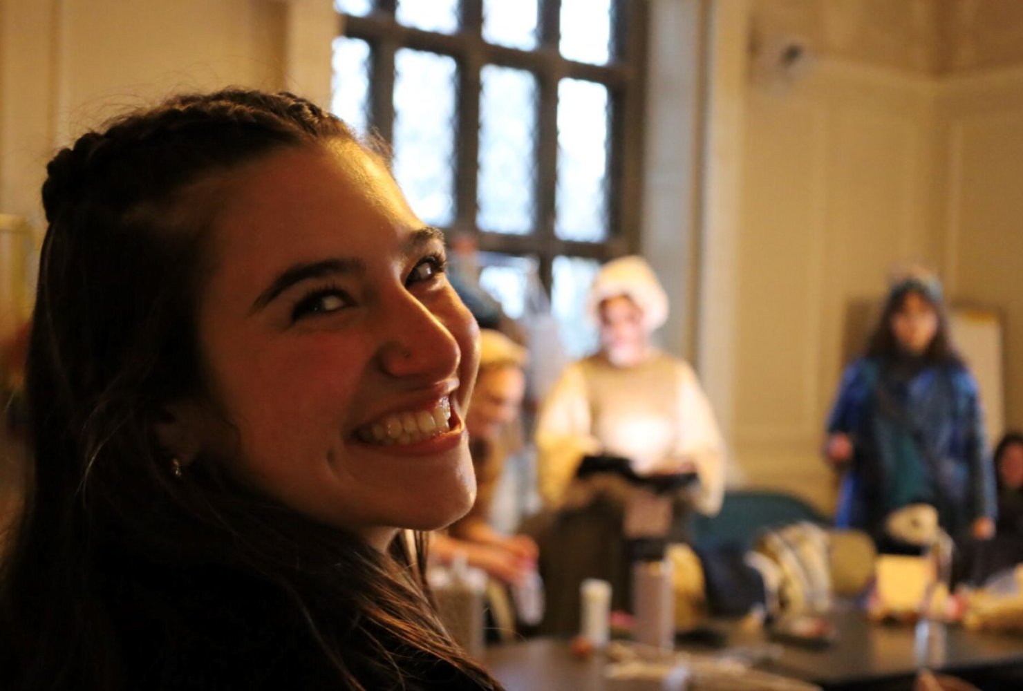 Anna smiling back toward the camera.