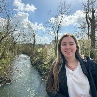 Galanis smiling infront of river.