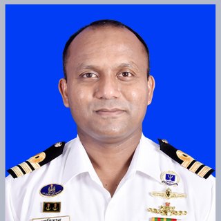 Headshot of Commander Nahian Baker Milky, Bangladesh Navy, in whites