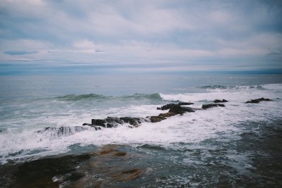 Waves crashing along a shoreline