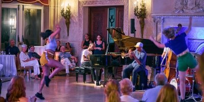 Musicians and dancers performing for an audience