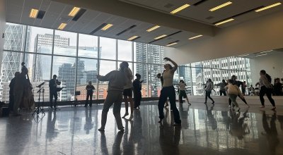 Salve students dancing jazz in Calgary in large room with big windows.