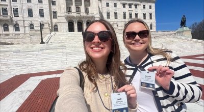 Spengler and Battcher outside of the Rhode Island State House as part of the R.I. Civic Leadership Program.