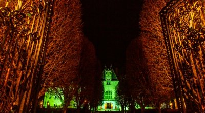 Ochre Court lit up green.