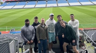 Students hold a replica of the MacCarthy Cup at Croke Park.