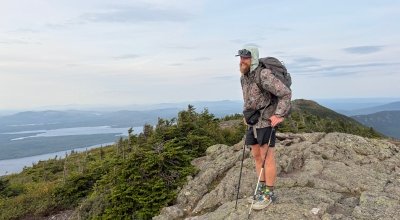 Crocker at the top of a mountain, hiking the Appalachian Trail.