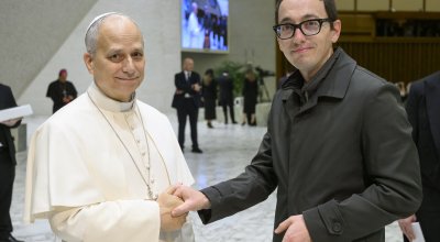 Michael shaking hands with Pope Leo XIV