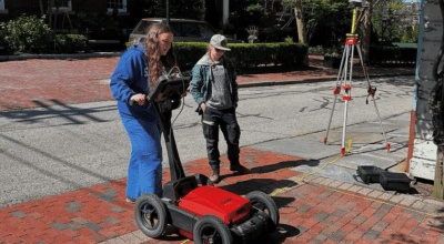 Dufresne using ground penetrating radar to conduct archaeological research in Rhode Island.