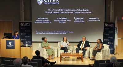 Panelists on stage at Pell Center event