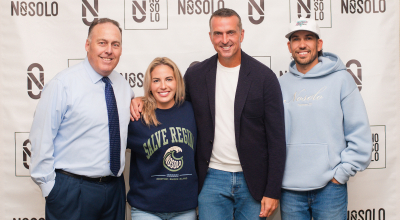 pro athlete, NOSOLO sponsors, AD group in front of step-and-repeat