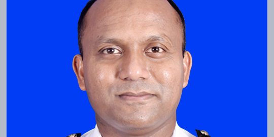 Headshot of Commander Nahian Baker Milky, Bangladesh Navy, in whites