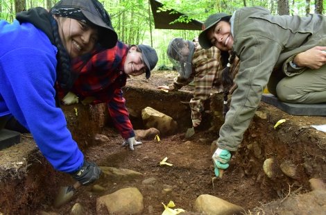 group of students digging
