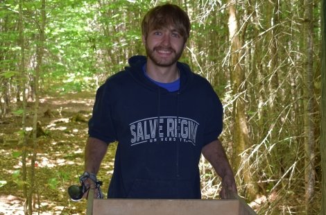 student using sifting screen