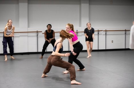 Students actively learning moves in the Salve Dance studio