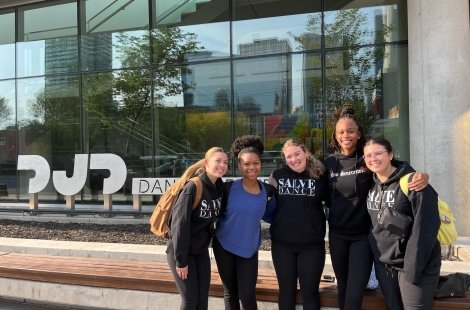 Students pose outside Decidedly Jazzworks Dance in Calgary