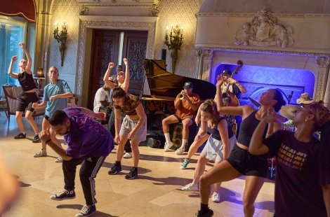 Students performing Jazz dance to live music in Ochre Court ballroom