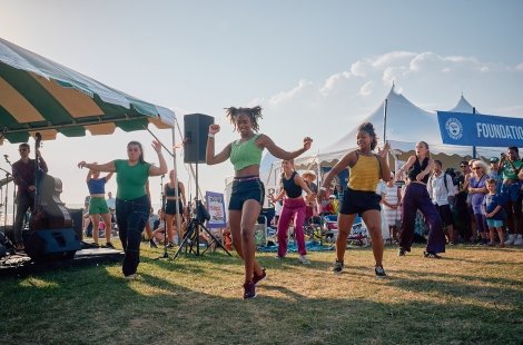Dance students performing outside a tent at Newport Jazz Festival