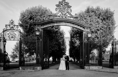 Bride and groom at the Ochre Court gates