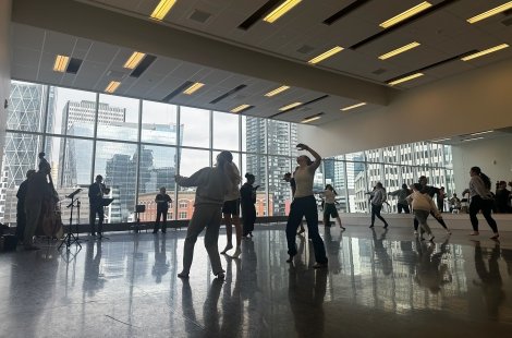 Salve students dancing jazz in Calgary in large room with big windows.
