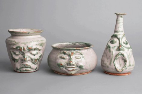 Ceramic vases with faces by Steph Wills