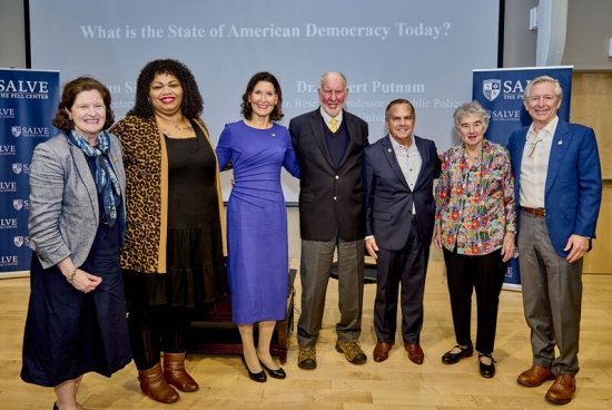Group photo of Putnam, Armstrong and others in Salve's Bazarsky Lecture Hall