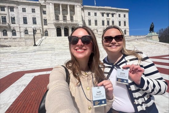 Spengler and Battcher outside of the Rhode Island State House as part of the R.I. Civic Leadership Program.