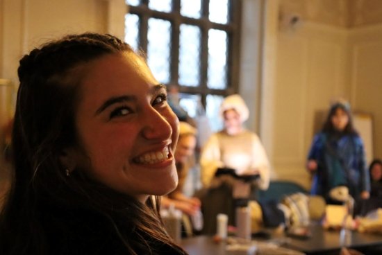 Anna smiling back toward the camera.