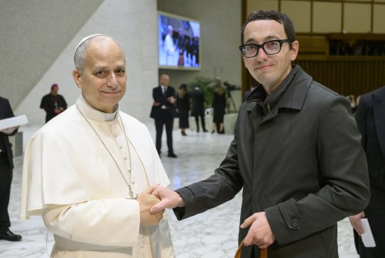 Michael shaking hands with Pope Leo XIV