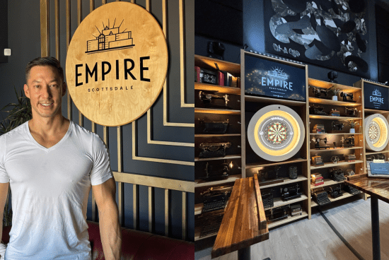 Ed Wu in white t-shirt in front of circular Empire logo.
